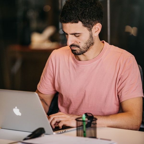 man working on laptop man working on laptop