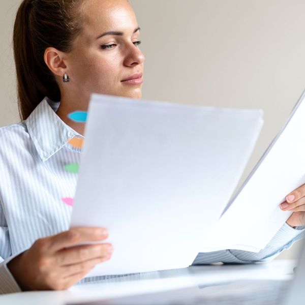 woman reviewing tax documents