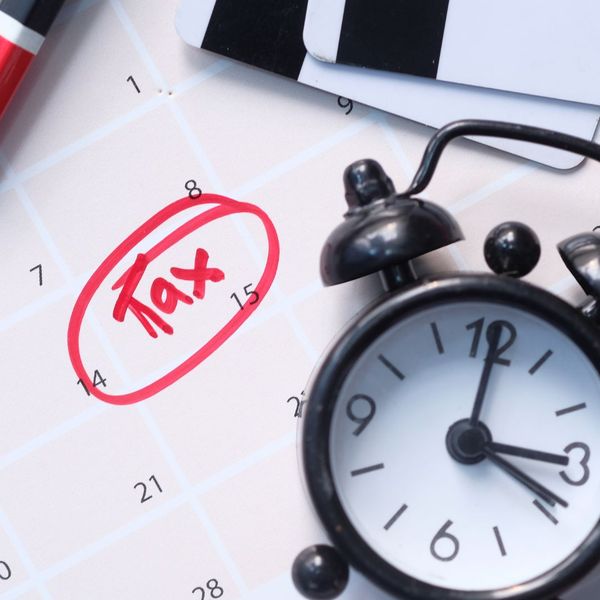 tax date circled on calendar with clock