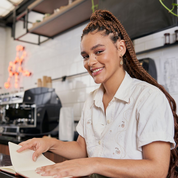 business owner smiling business owner smiling