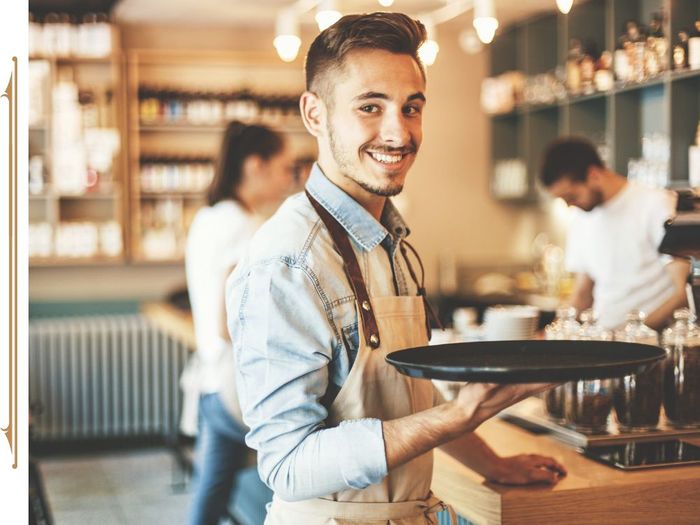 Server holding an empty tray