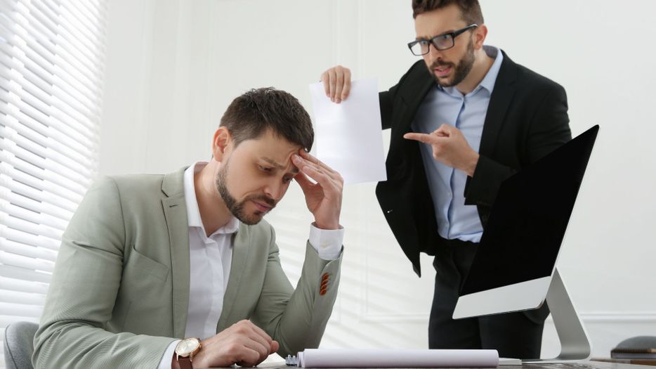 Boss yelling at an employee