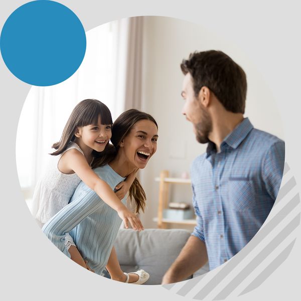 Family laughing in living room