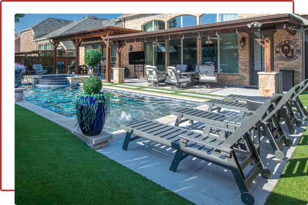 home with a pool and turf