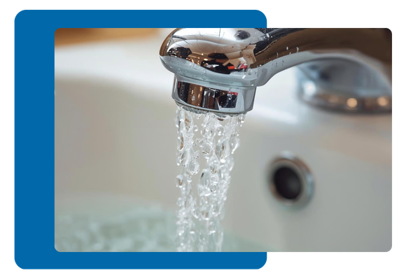 Water coming out of a faucet