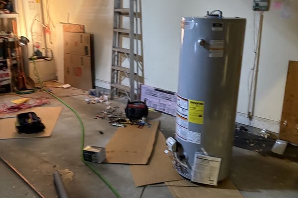 water heater being repaired