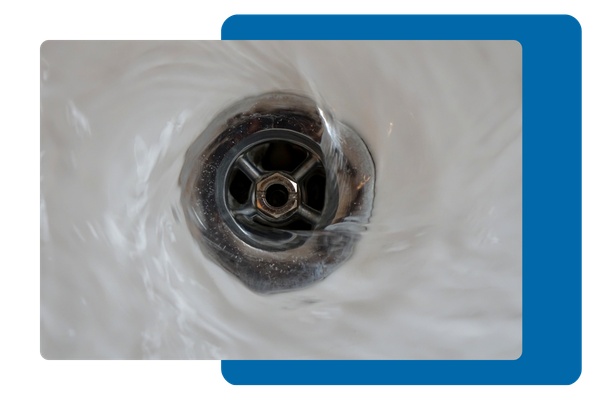 Focus of a drain with water moving around it