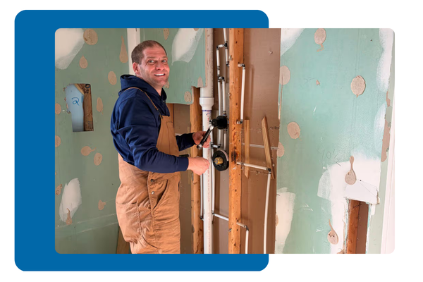 All Pro Residential employee is repairing a pipe