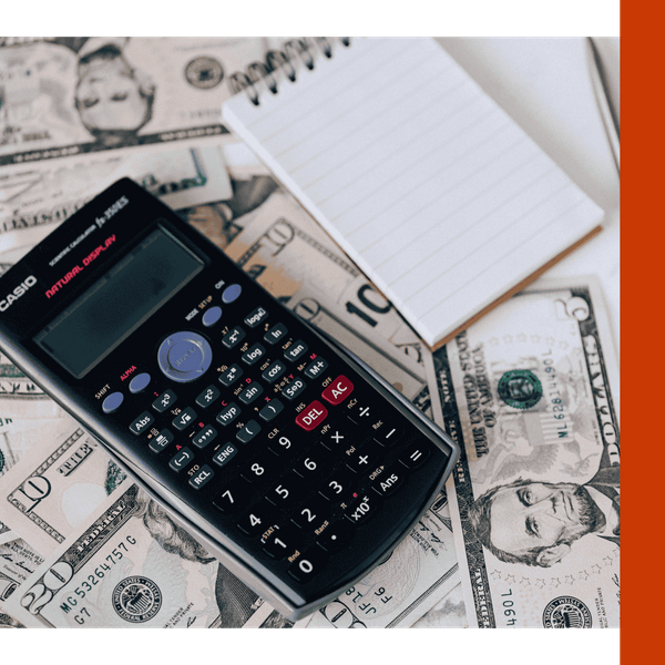 Image of money with a calculator Image of money with a calculator