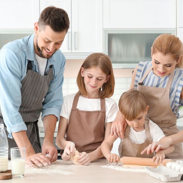 a family cooking together