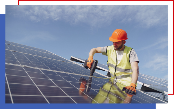 tech working on solar panels