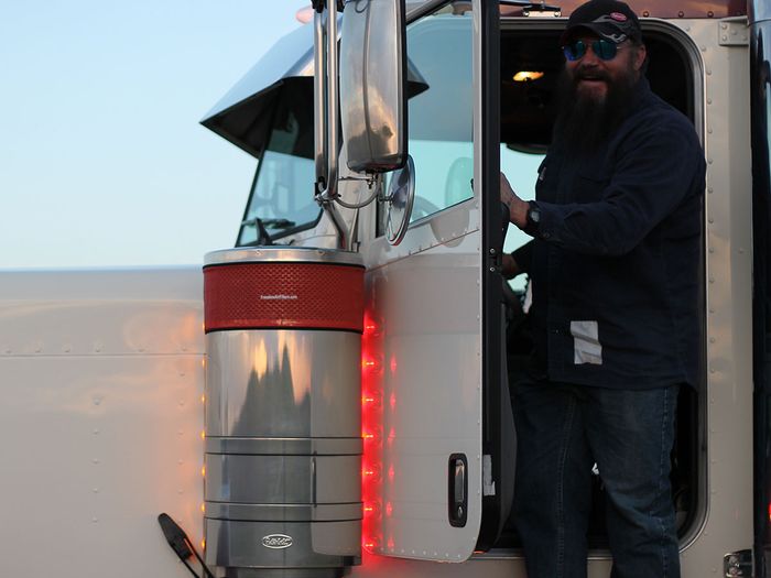 Image of man with Peterbilt truck