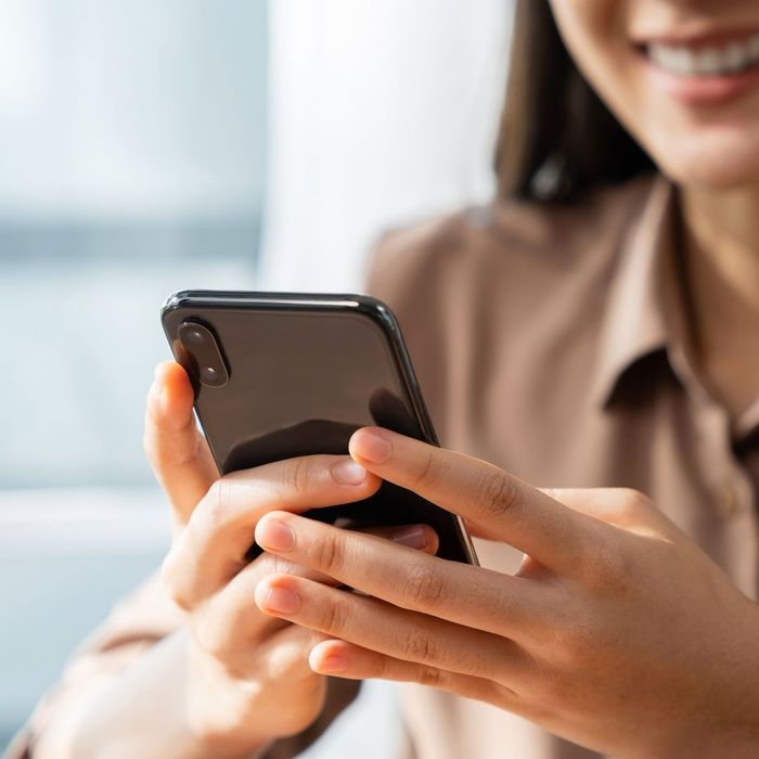 person looking at her phone
