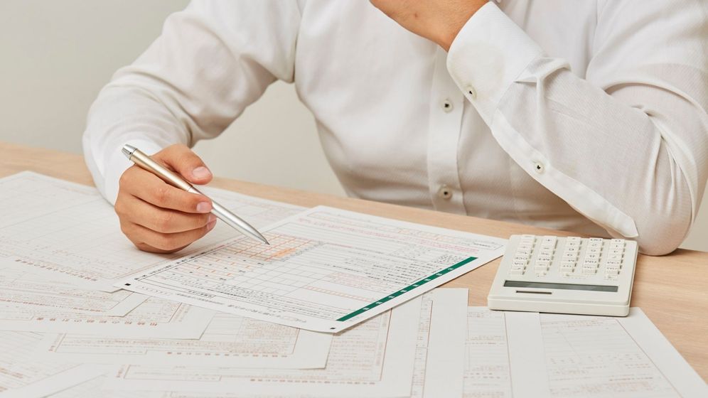 person reviewing financial documents
