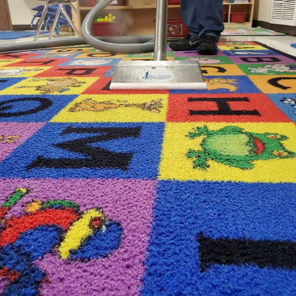 A child's carpet being cleaned