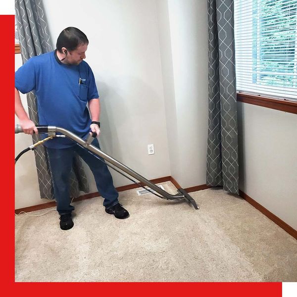 technician cleaning carpet