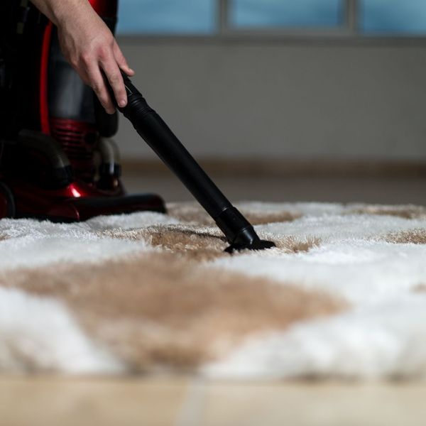 Carpet vaccuming. Carpet vaccuming.