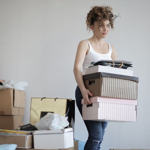 woman moving boxes