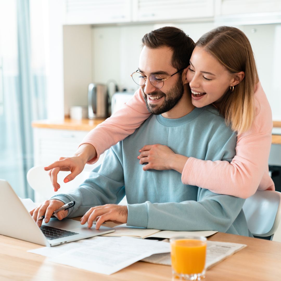 excited couple finding affordable housing