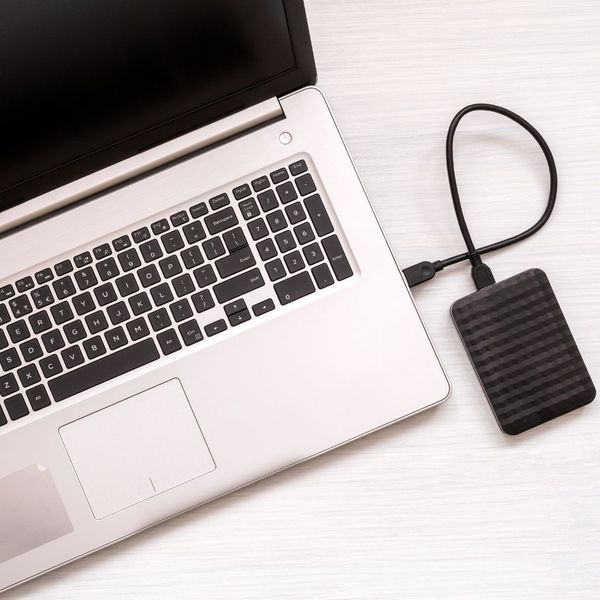 an external hard drive plugged into a computer