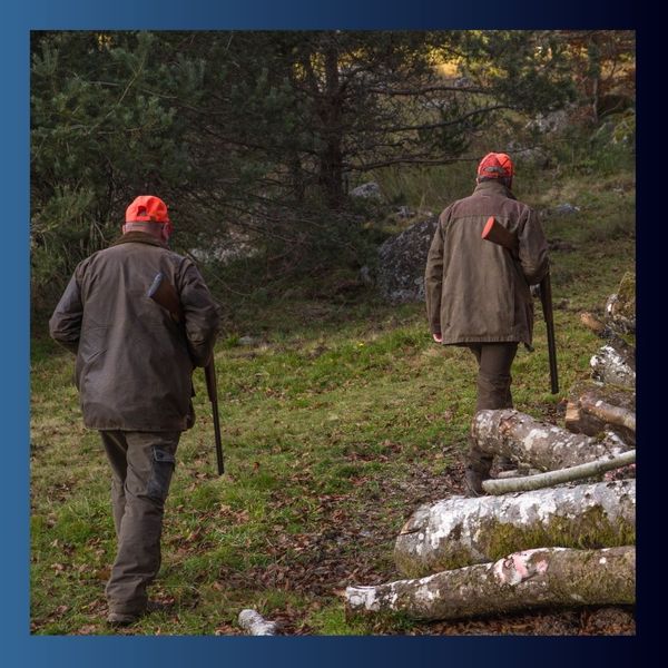 two people hunting How Hunting Clubs Enhance Community Connections.jpg