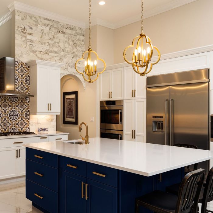 large kitchen island with gold accents