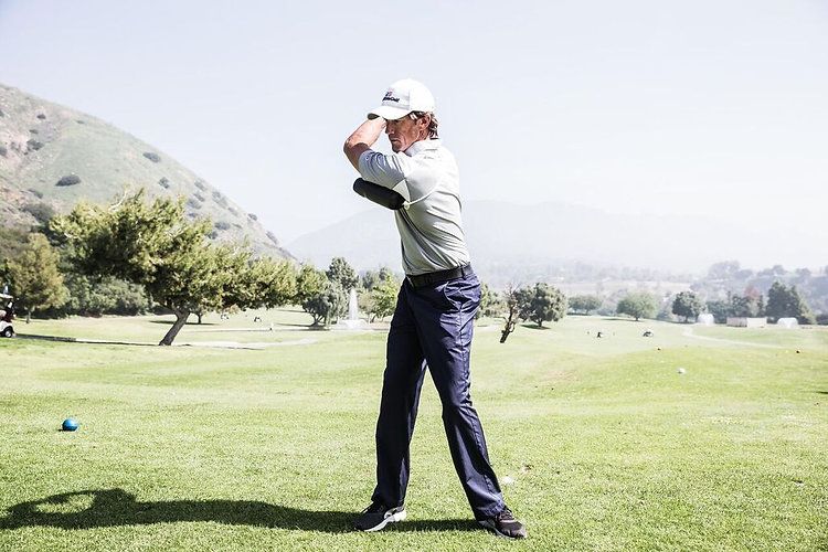 Dan Martin demonstrating the use of the PRO Swing Training System