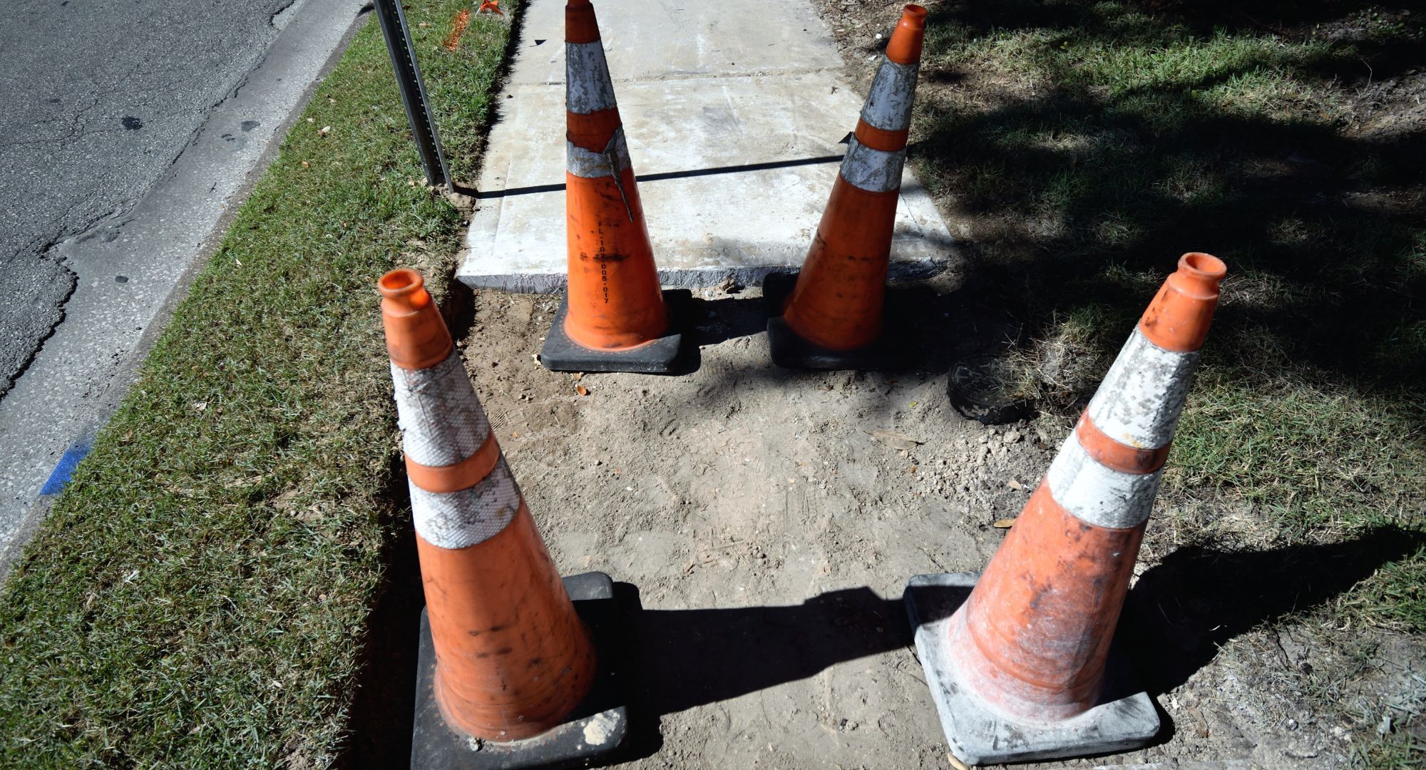 M32397 - Stabil Solutions - Blog  Hero 5.2024- Concrete Sidewalk Leveling.jpg