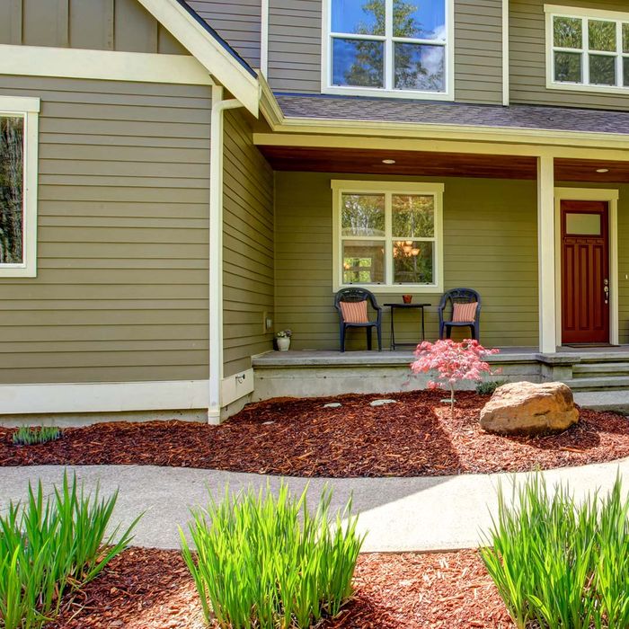 Home with concrete pathway