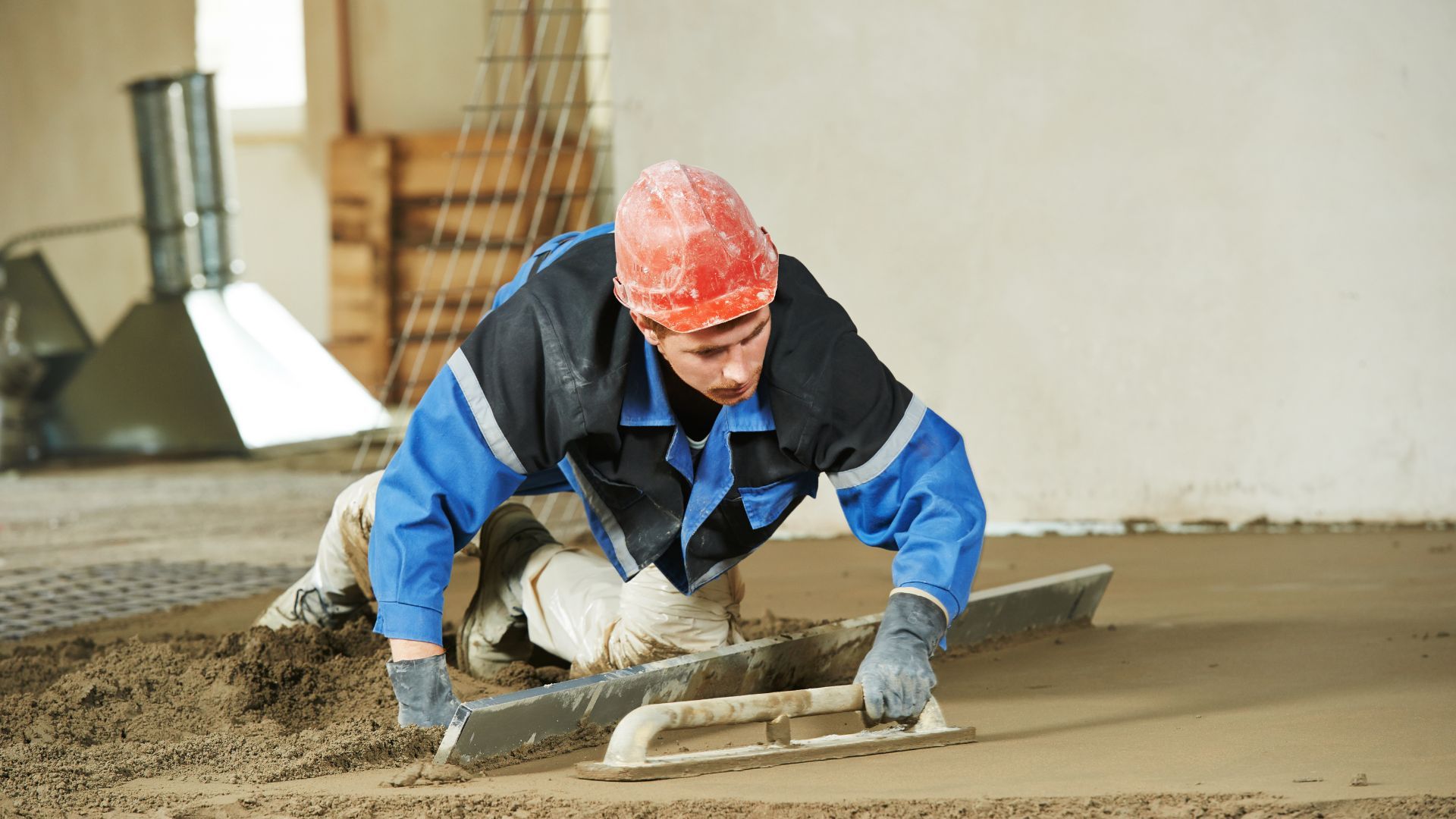 contractor shaping concrete