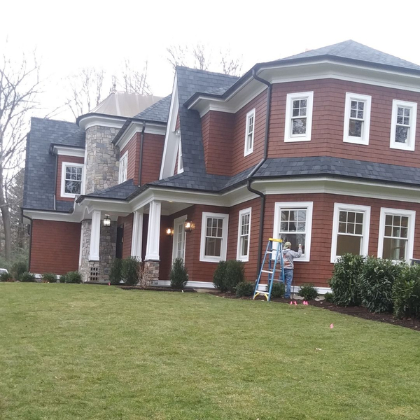 Image of a home built with the finishing touches being added