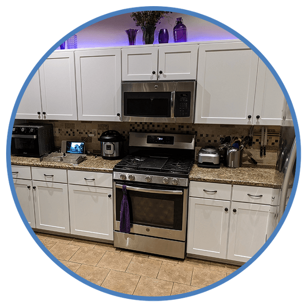 New white cabinets in kitchen with stove