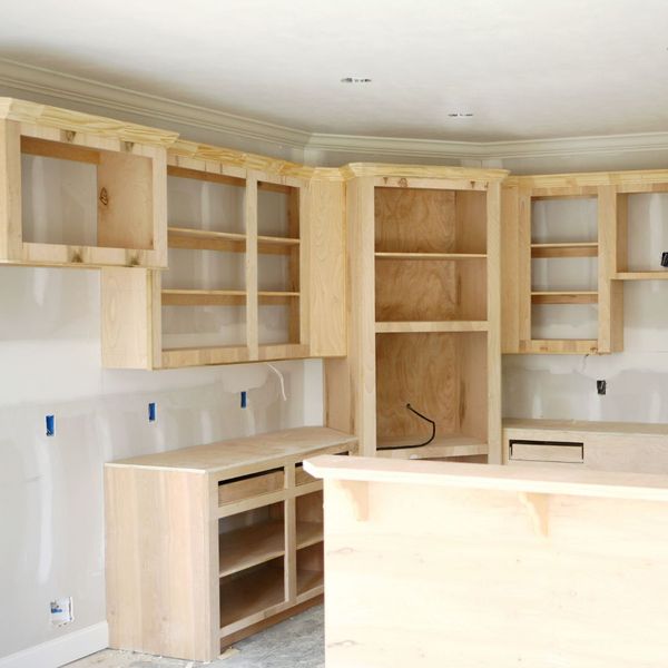 Cabinets being refaced in a kitchen.