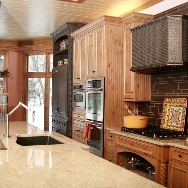 Kitchen with contemporary wooden cabinets. 
