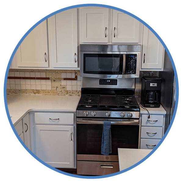 White cabinets with gold hardware