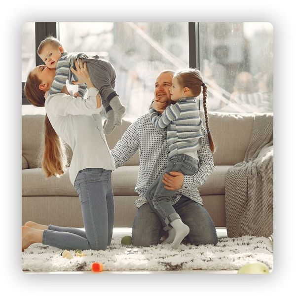 Happy family inside of their home