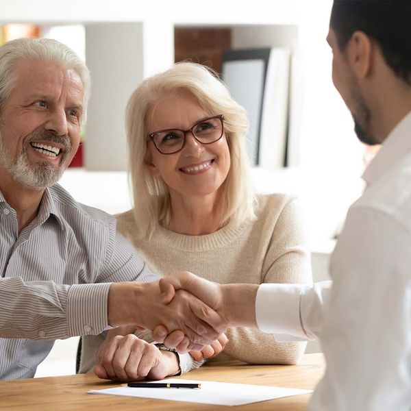 Older couple meeting with a family lawyer