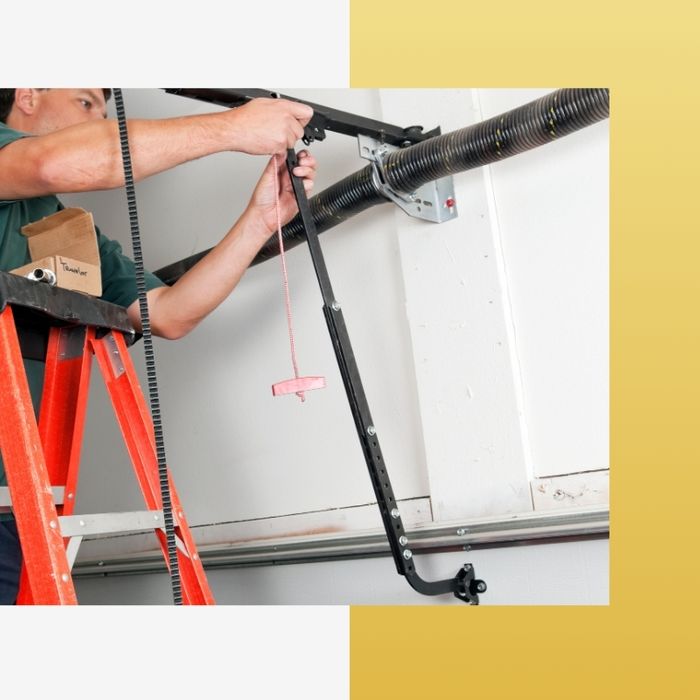 Man working on a garage door