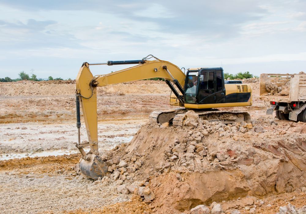 an excavator digging up dirt