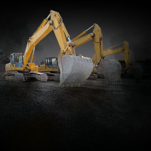 a row of site excavators