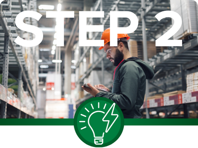 Step 2: We Install Free LEDs. - Worker in a hardhat in a warehouse aisle checking a tablet, with a lightbulb icon.