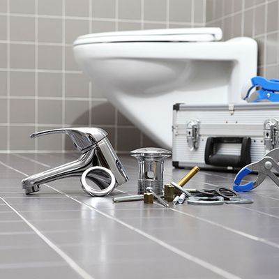 Image of a bathroom and a sink under repair