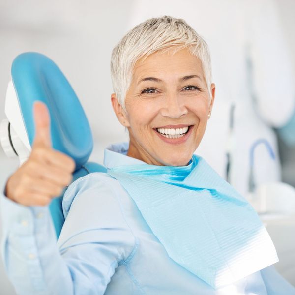 smiling woman at dentist