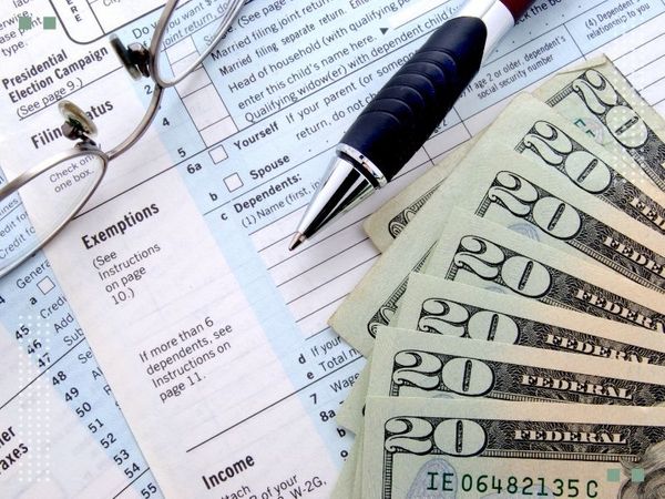 Tax paperwork and cash.