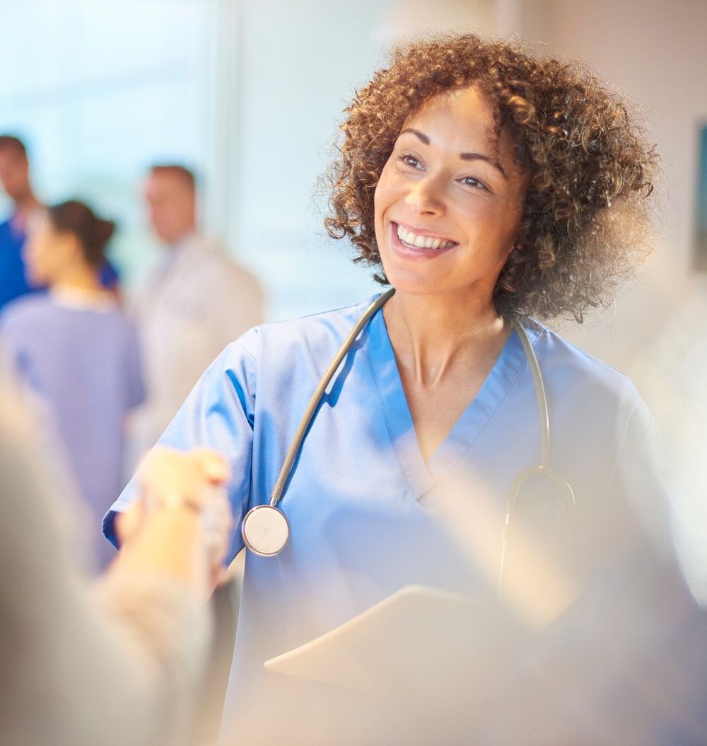 nurse shaking hands