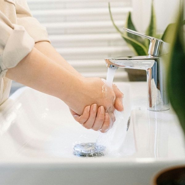 close-up of someone washing hands