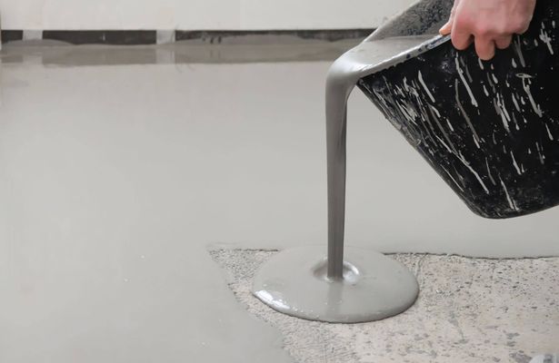 pouring concrete from a bucket
