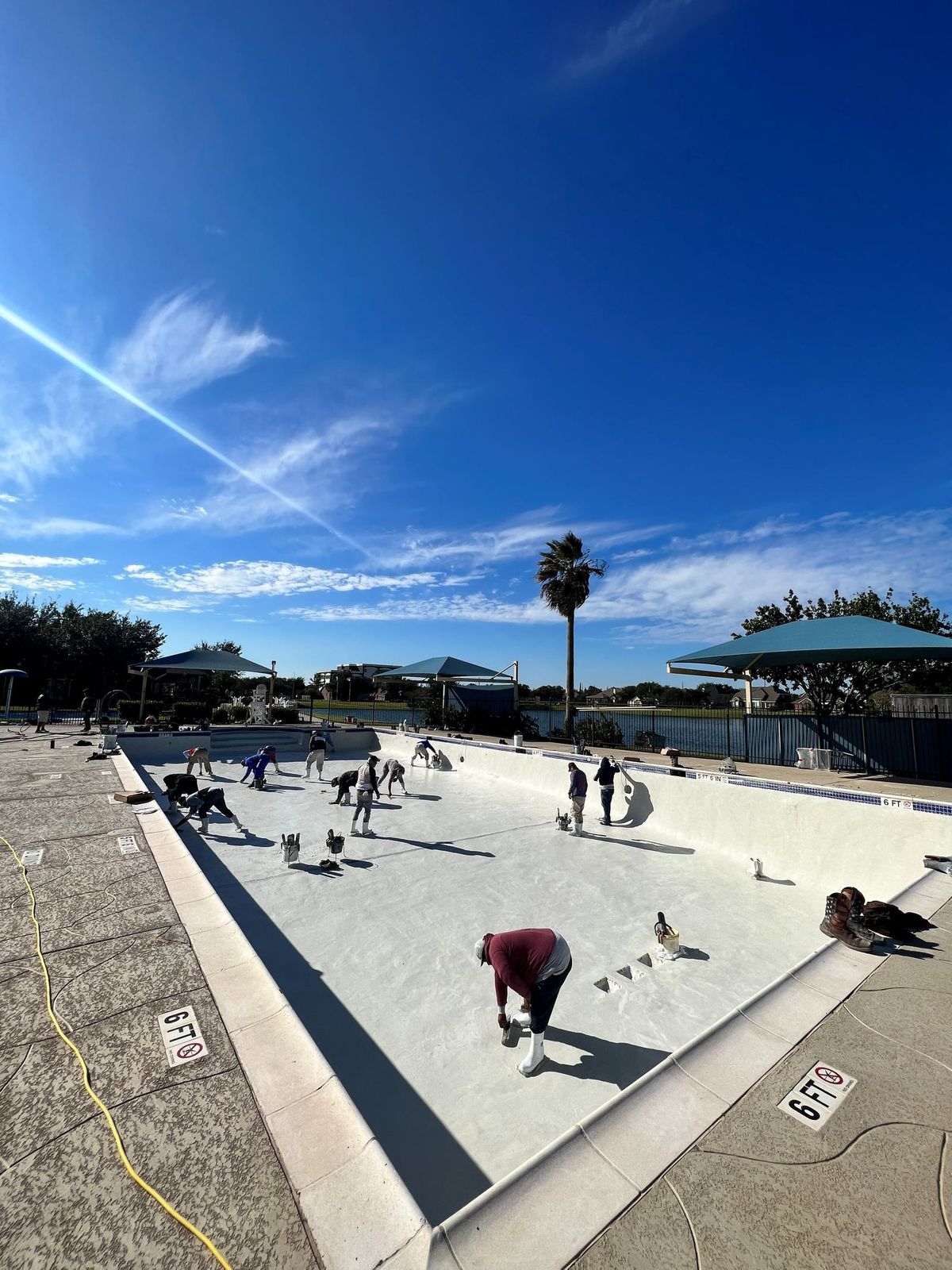 The Express Pool Plastering crew at work on a Kingwood, TX pool project finished on schedule