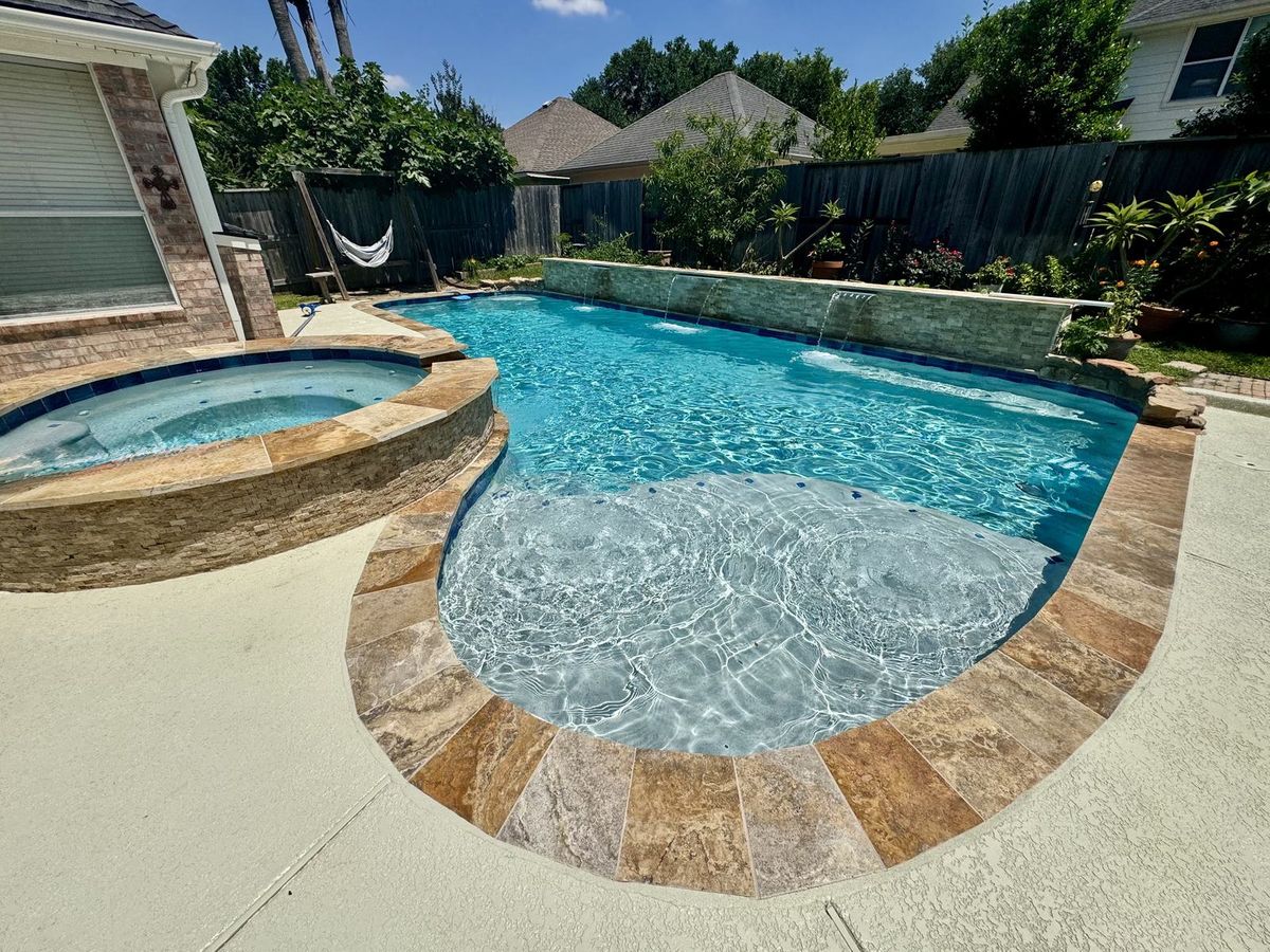 Newly built swimming pool in Spring, TX completed start to finish by Express Pool Plastering and Repairs
