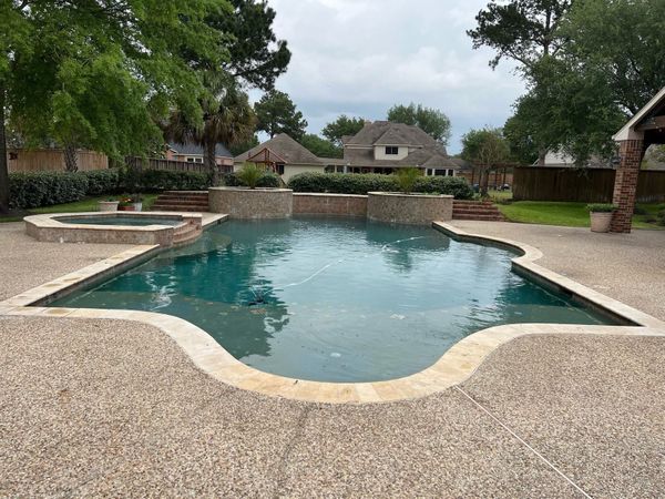 Houston pool with a worn, dull plaster surface before restoration